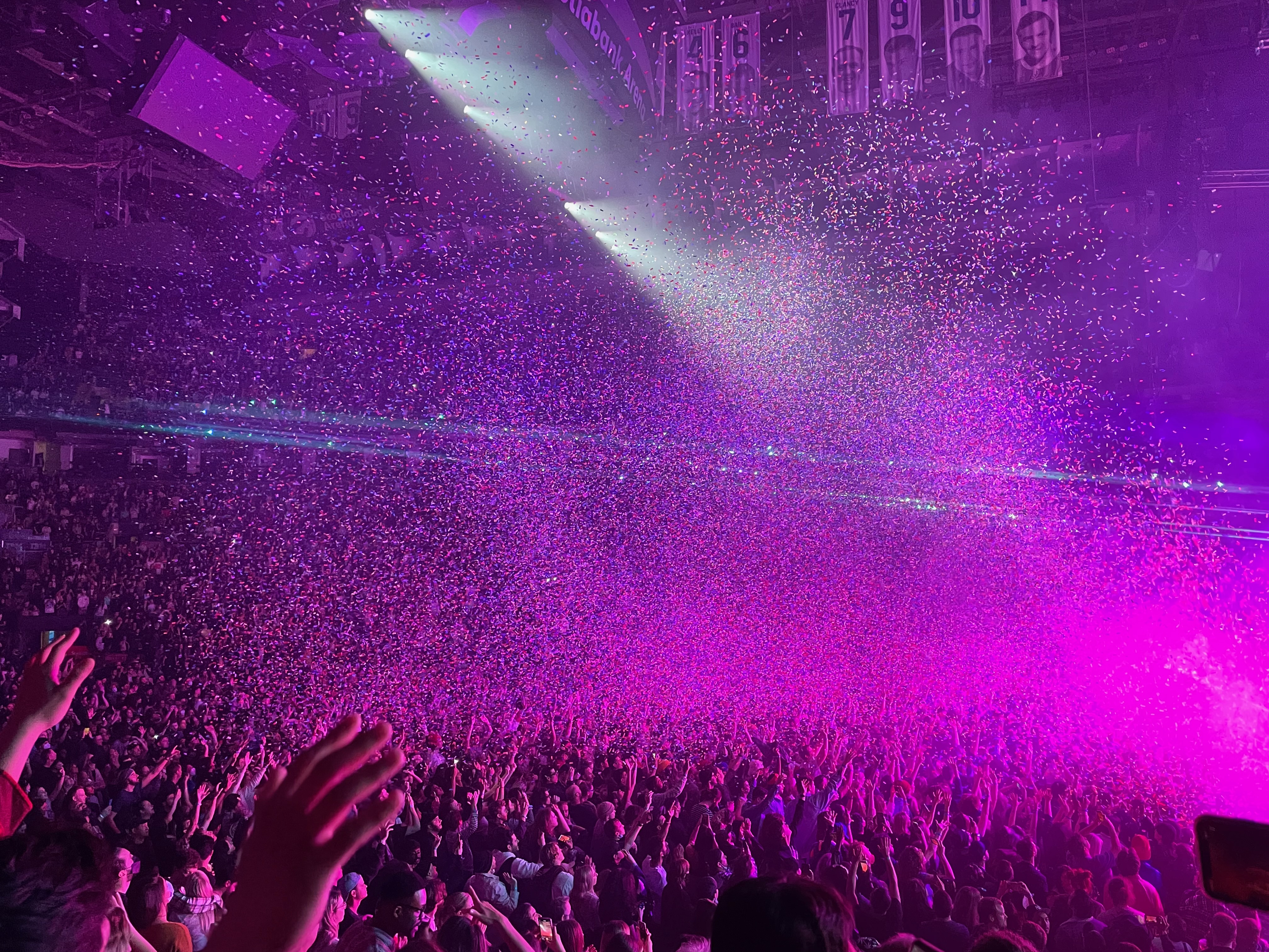 confetti raining down onto crowd at concert